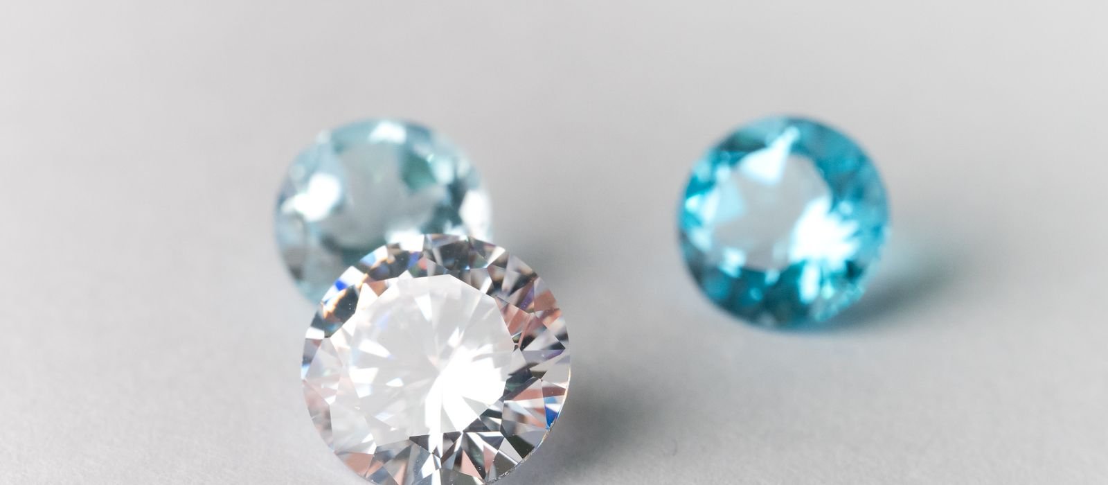 Macro photograph of brilliant cut gemstones